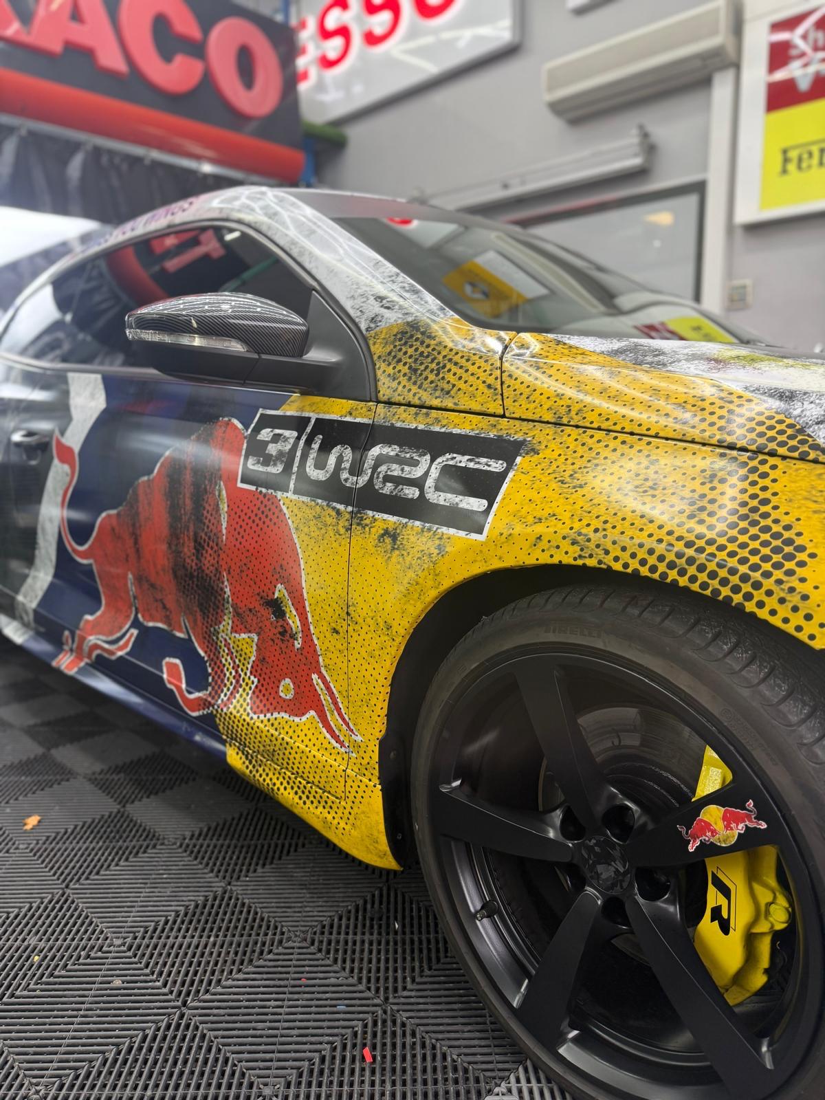 Close-up of custom racing vehicle wrap detail by ATZ Group
